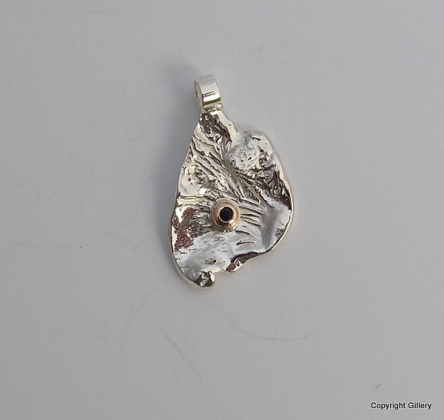 Silver & 9ct Gold pendant with blue Sapphire