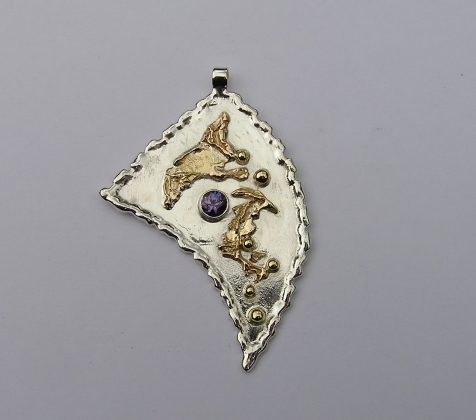 Silver & 18ct Gold pendant with purple Sapphire