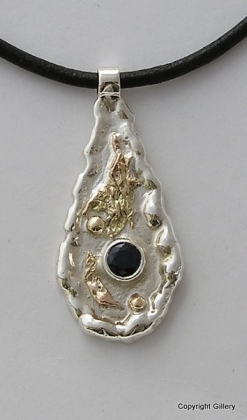 Silver & 18ct Gold pendant with blue Sapphire