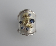 Silver & 18ct gold ring with blue Sapphires