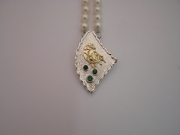 Silver & 18ct gold pendant with 2 Tsavorites and 1 Chrome Tourmaline