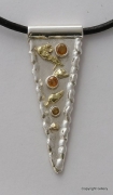 Silver & 18ct Gold pendant with yellow Sapphires